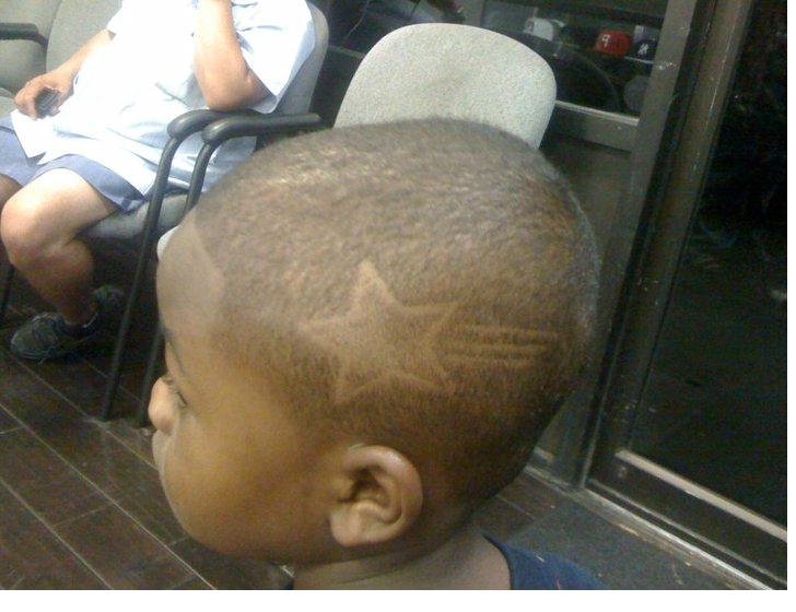 Young client getting a kids haircut at Fade N' Shave Aurora CO